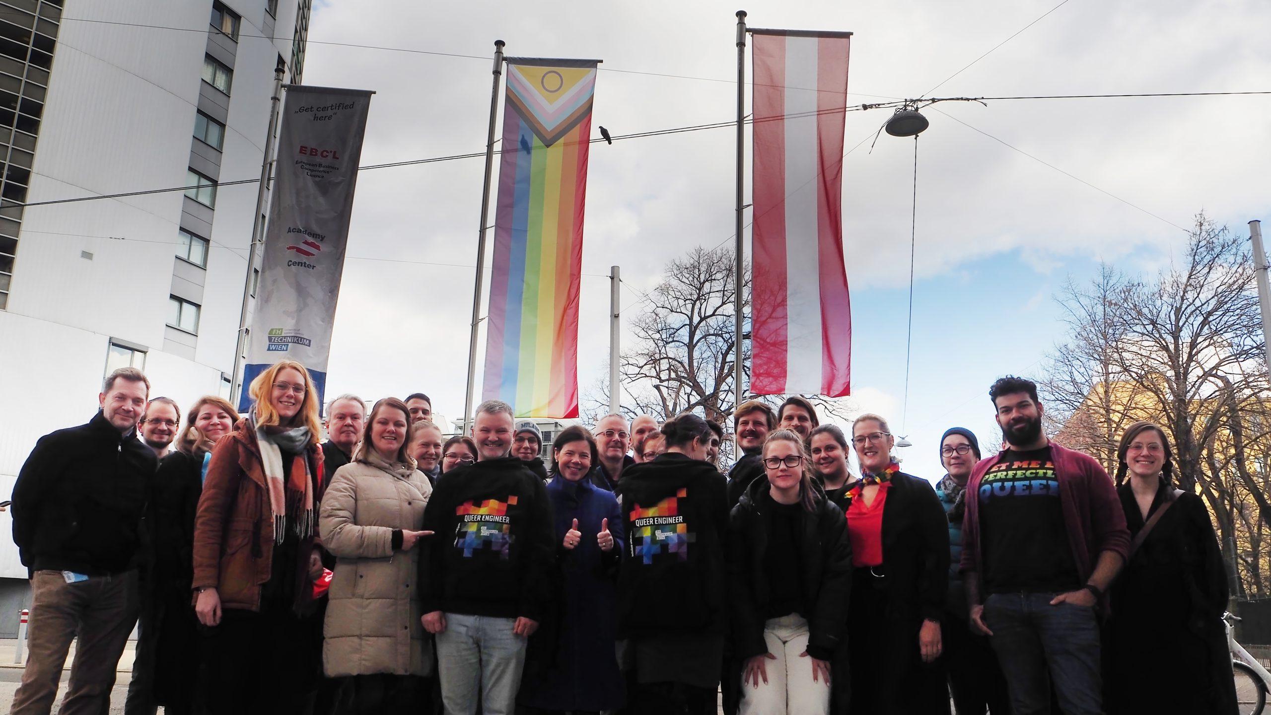 Group photo with pride flag